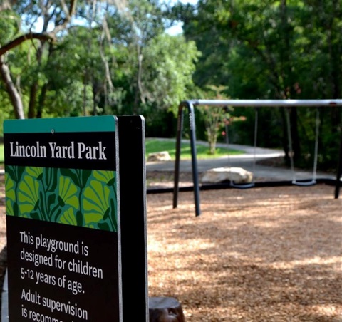 Lincoln Yard Park sign and playground.jpg