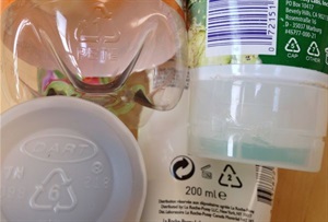 the bottom of plastic bottles showing the recycling codes